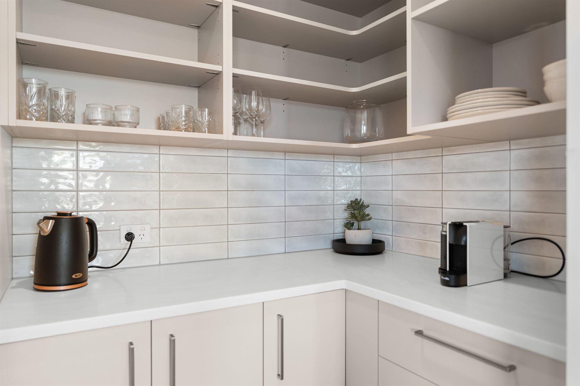 Butler's pantry / scullery with shelving and stone benchtop