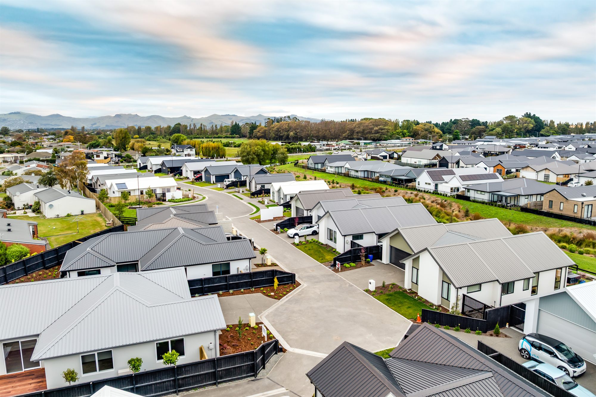 Aerial view of the Elmbridge Mews community along the stream